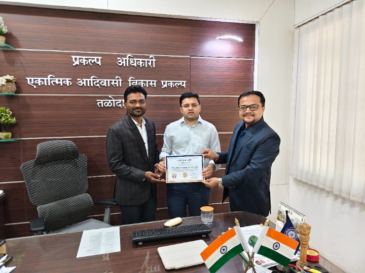 WeClocks Technology Pvt Ltd Receiving 1st Prize Certificate at Integrated Tribal Development Project Taloda Office